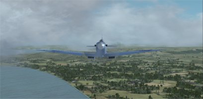 09 flying along coast.jpg
