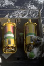 a-crewman-works-on-a-tmu-70m-liquid-oxygen-storage-tank-aboard-the-aircraft-ba9f32-640.jpg