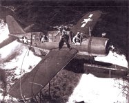 Kingfisher from USS Baltimore CA68 in Truk Lagoon rescuing a downed pilot 1944.jpg