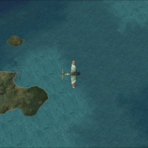 Top down view flying west to east over the islands of Kahoma-Shima (left) and Takojomi-Jima which lie in the channel between Iriomote-Jima and Ishigak