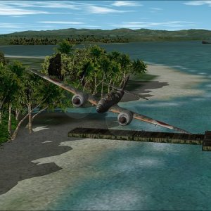 Kaoe Bay: looking east from the jetty at Malifoet Vllage toward the wreck offshore from Kapita Village and beyond towards the airfields at Kaoe.