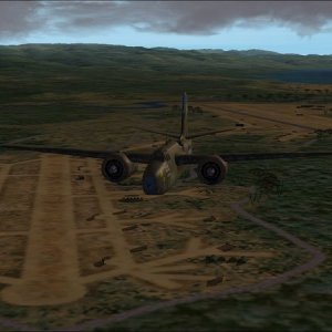 Flying east over Lunga Point with Fighter I in the foreground, Henderson Field further along and Kokum Point Field (Fighter II) in the distance.