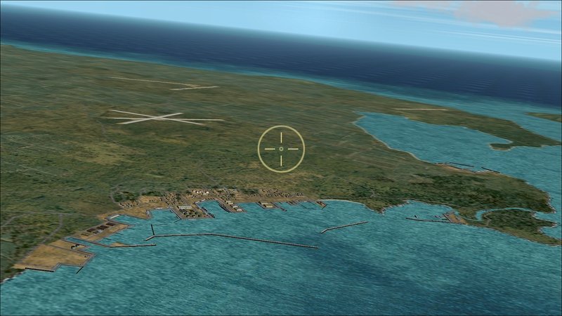 Approaching  Hirara Harbor, Myako-Jima, from the NW with Hirara, Nobara and Sukama airfield in the distance. Miyako-Retto, of which Miyako-Jima is par