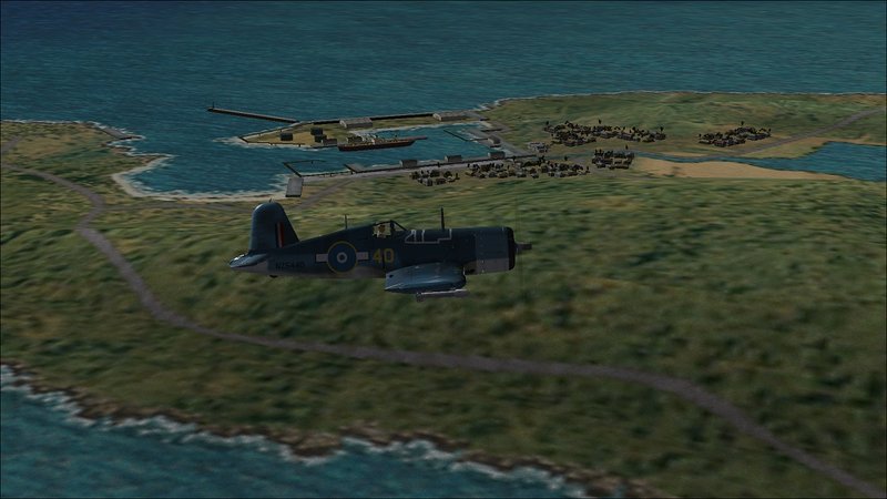 Flying east along south shore of Yonaguni-Jima looking north toward the small port of Kubura.