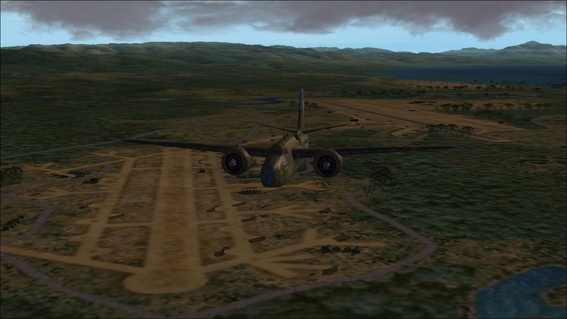 Flying east over Lunga Point with Fighter I in the foreground, Henderson Field further along and Kokum Point Field (Fighter II) in the distance.