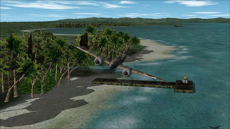 Kaoe Bay: looking east from the jetty at Malifoet Vllage toward the wreck offshore from Kapita Village and beyond towards the airfields at Kaoe.