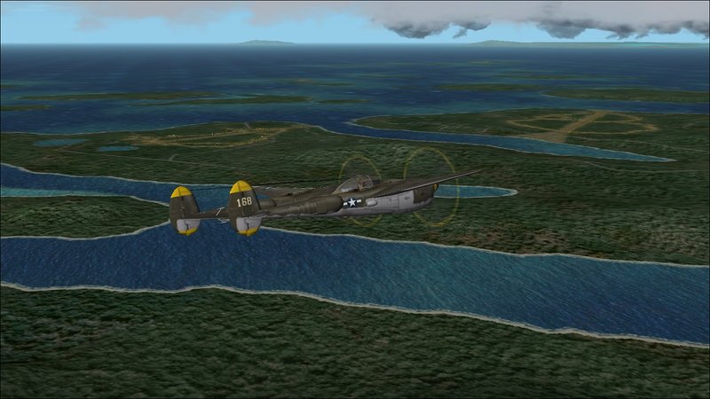 Russell Islands: flying south over Sunlight Channel with Sunlight Field (L) and Renard Field (R) in distance.